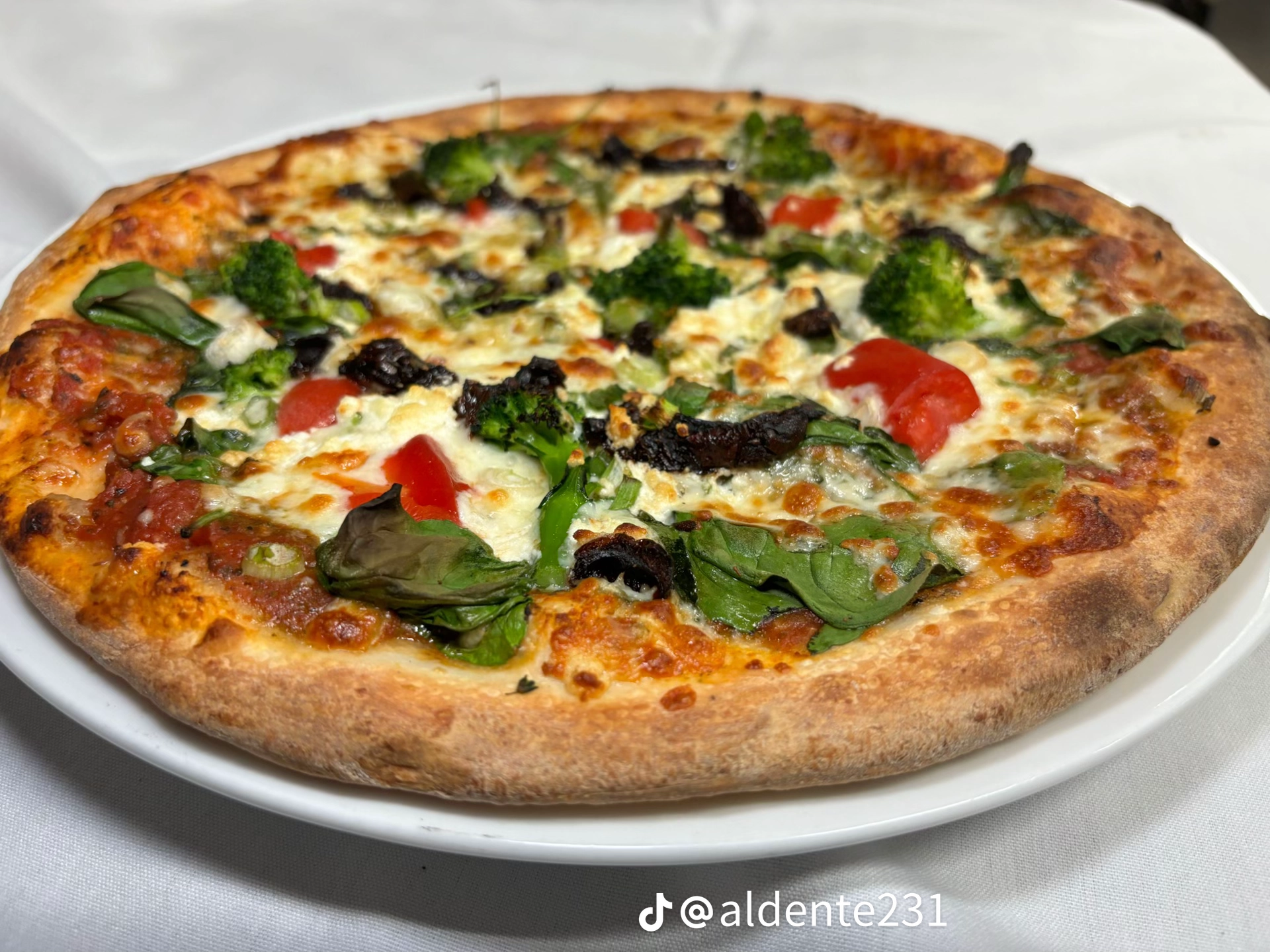 Vegetarian pizza with fresh vegetables